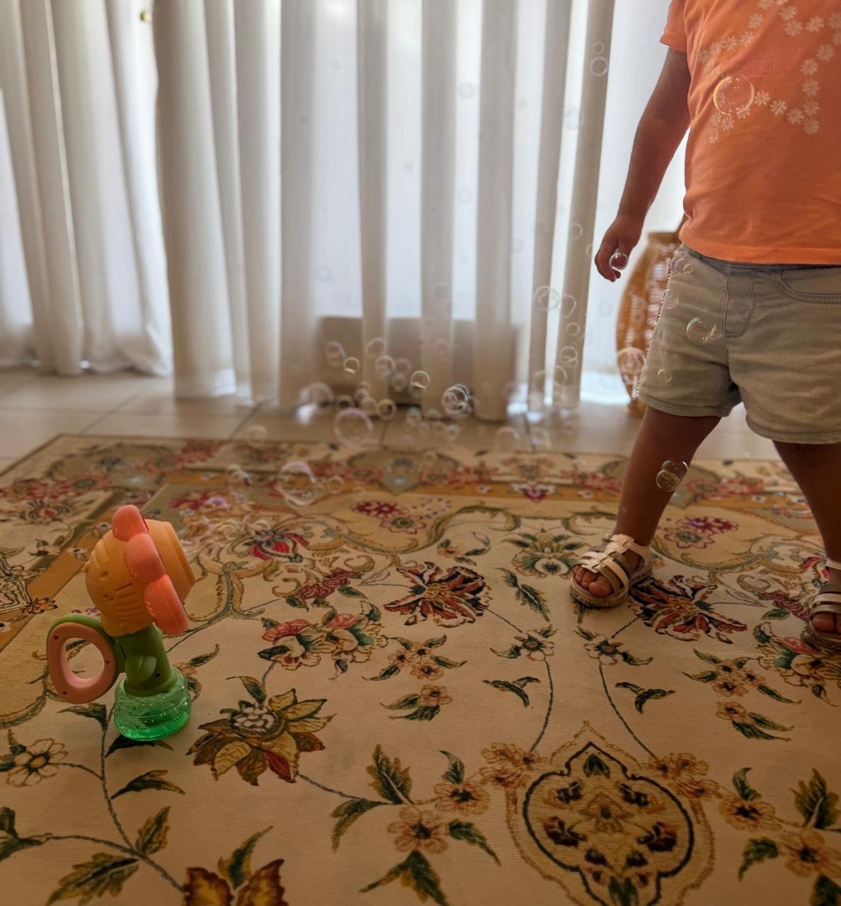Child taking part in a bubble-play activity